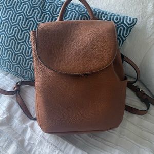 brown backpack purse